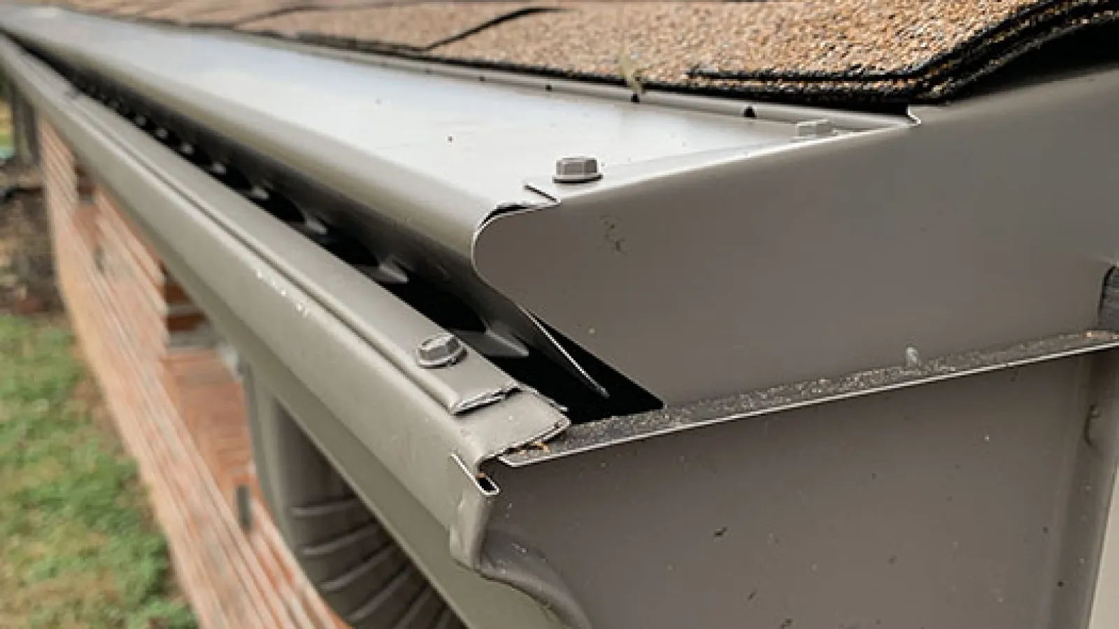 House with brown gutter in Marietta, GA