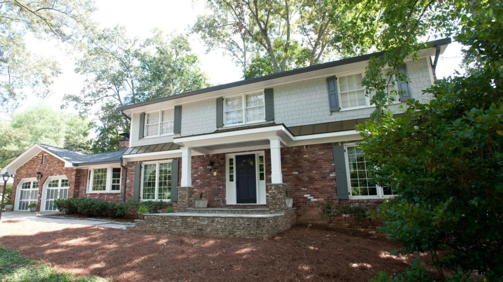 a brick house with a large front yard in Marietta, GA
