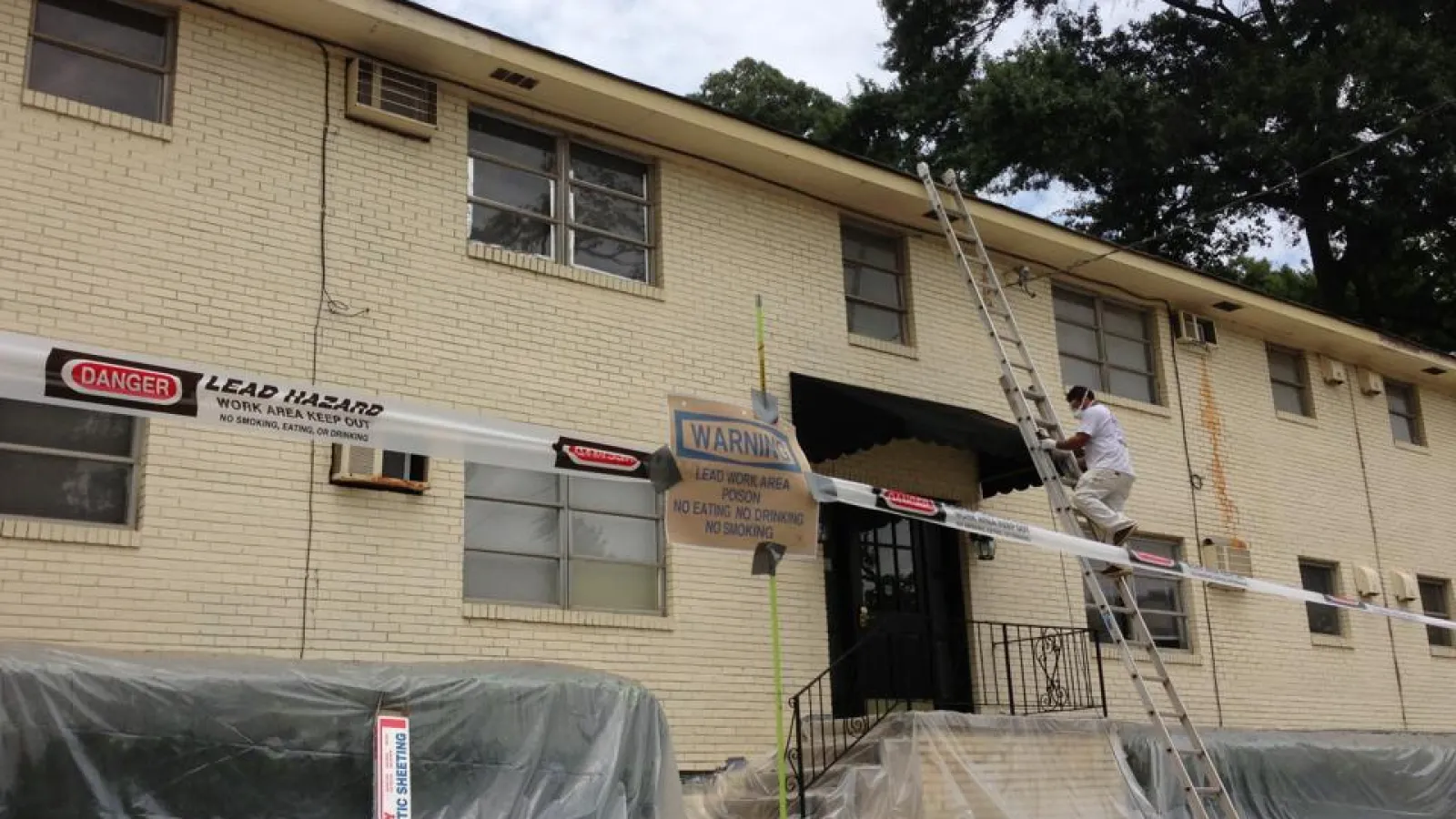 A commercial building in a process of exterior painting in Marietta, GA