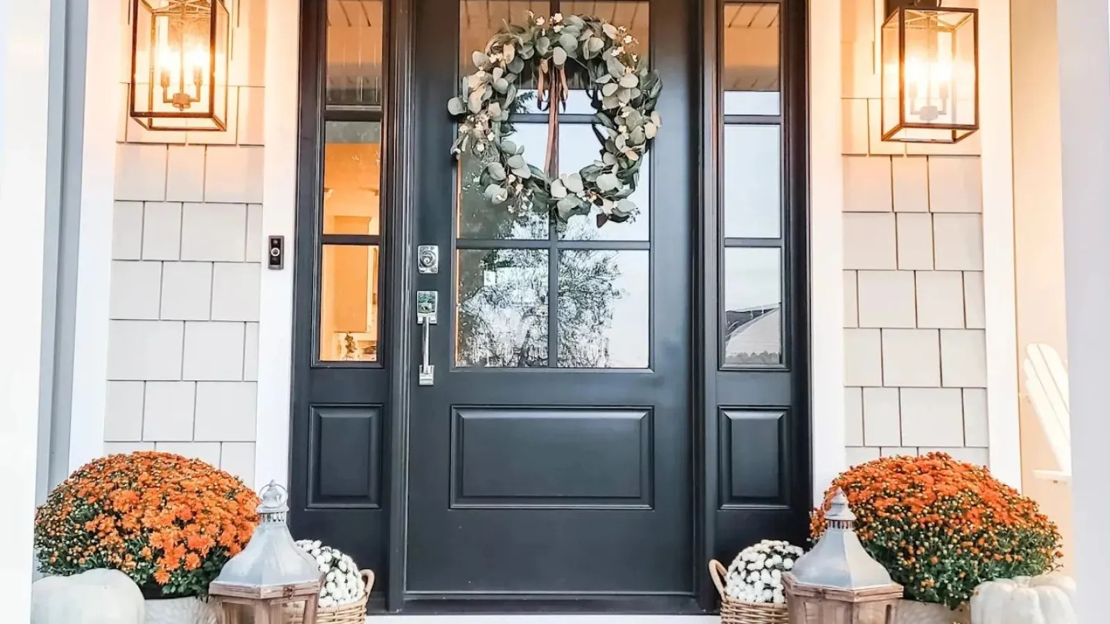 A black front door with flowers and decorations in Marietta, GA