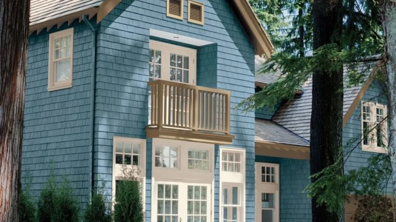 a blue house with a balcony in Marietta, GA