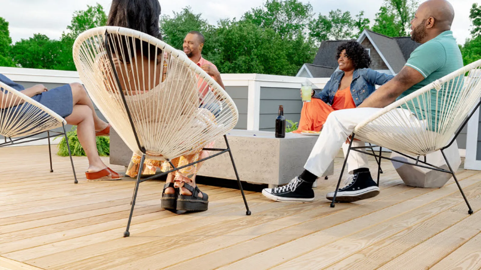 a group of people sitting in chairs on a deck in Marietta, GA