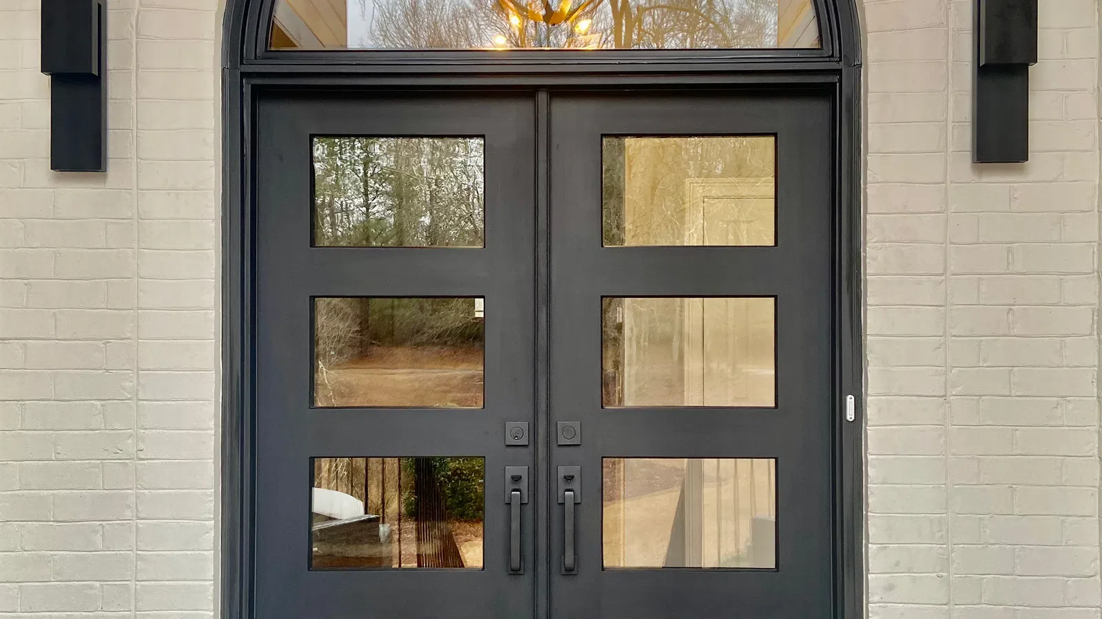 a black door with a glass window