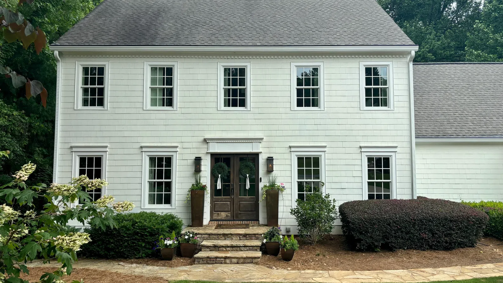 Metro Atlanta area home with white Infinity Windows installed by NG Windows