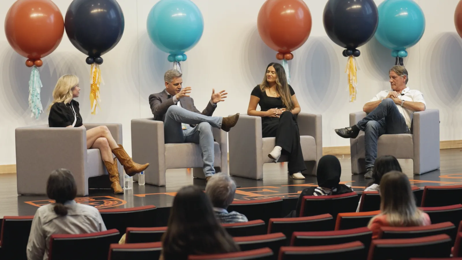 a group of people sitting in chairs