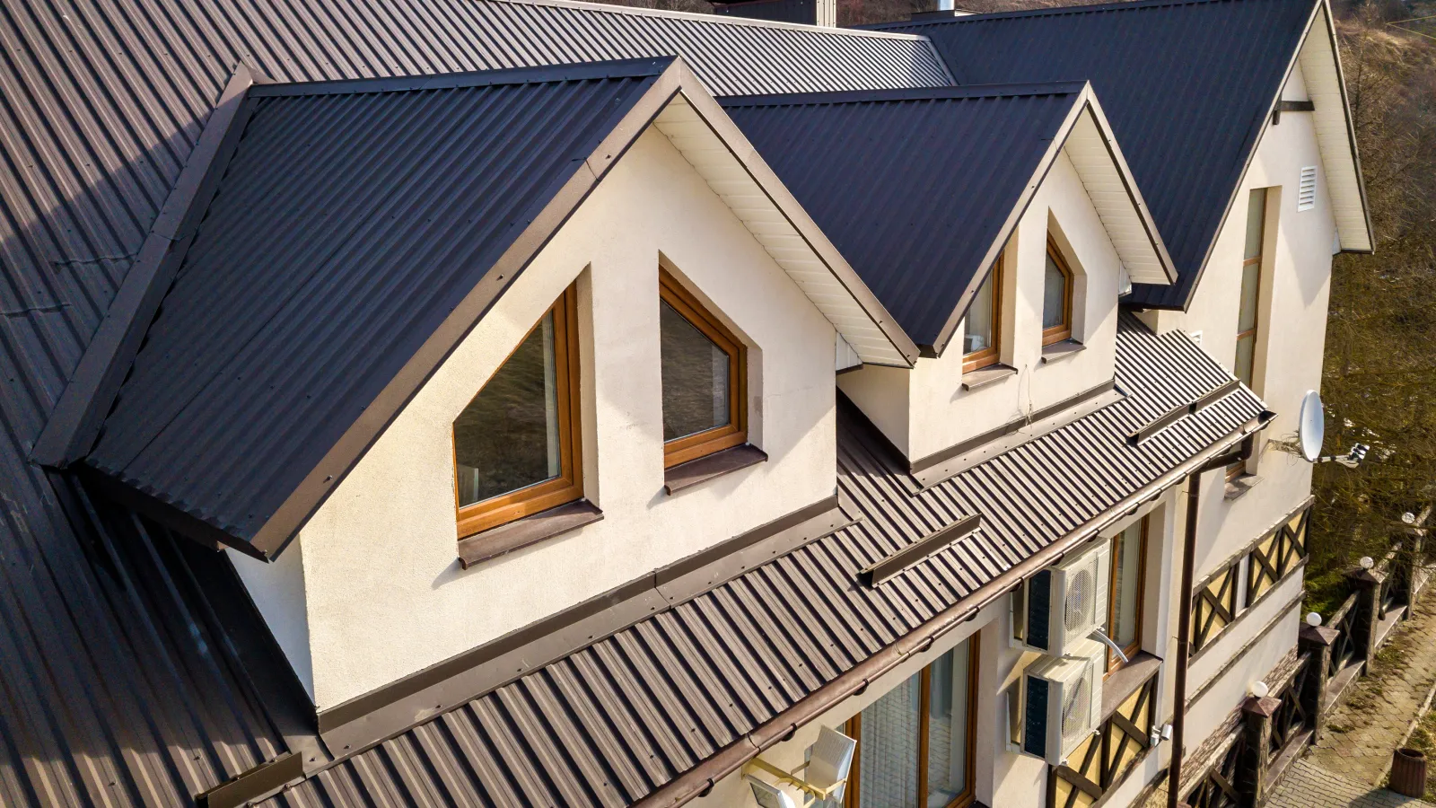 a house with metal ribbed panels