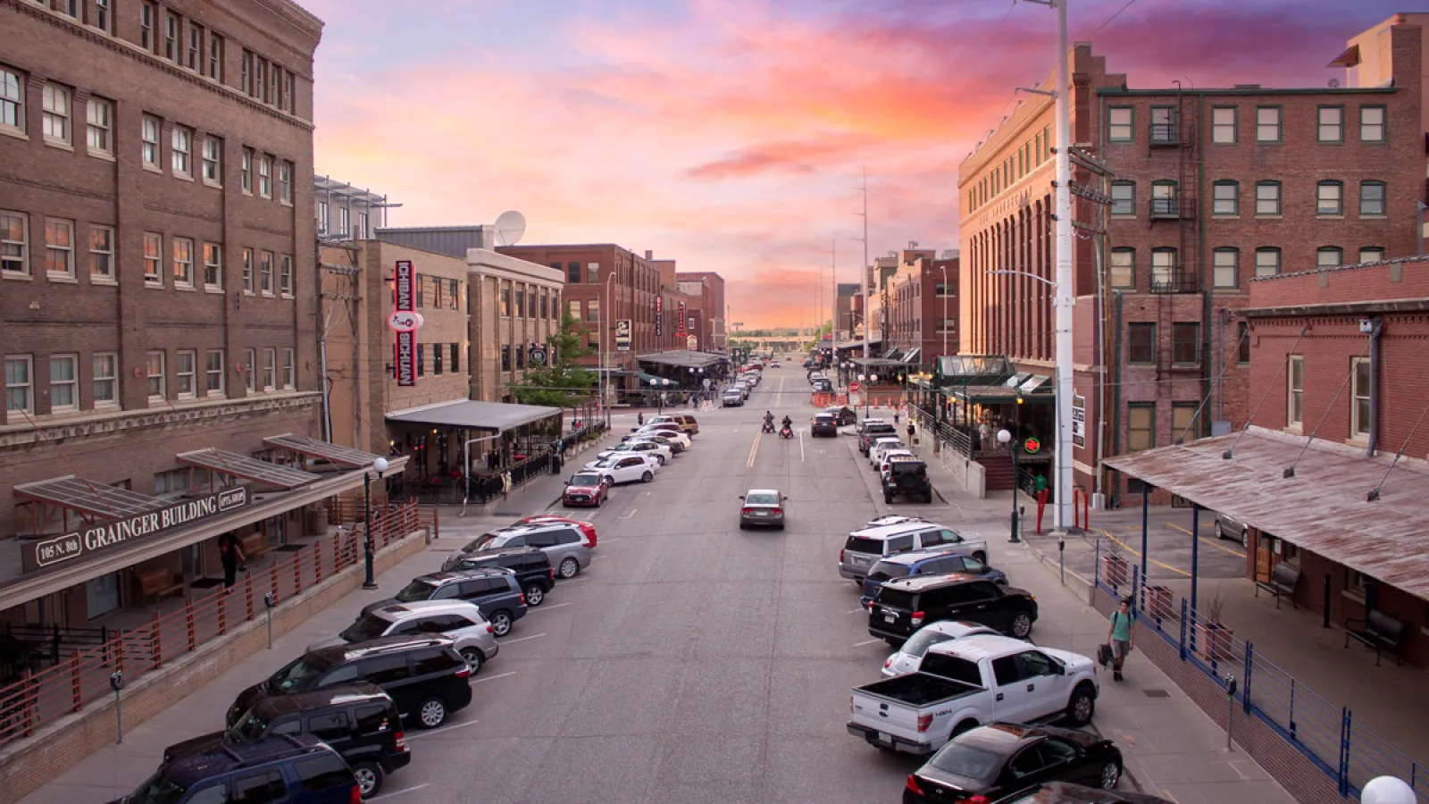 a street with cars parked along it