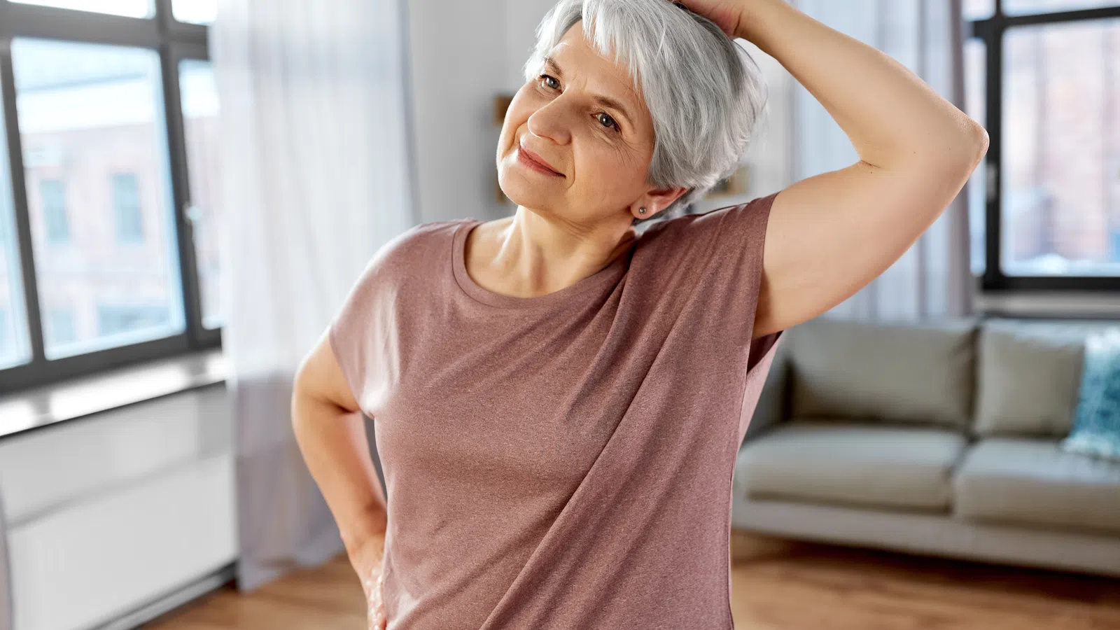 a person with the hair in a ponytail