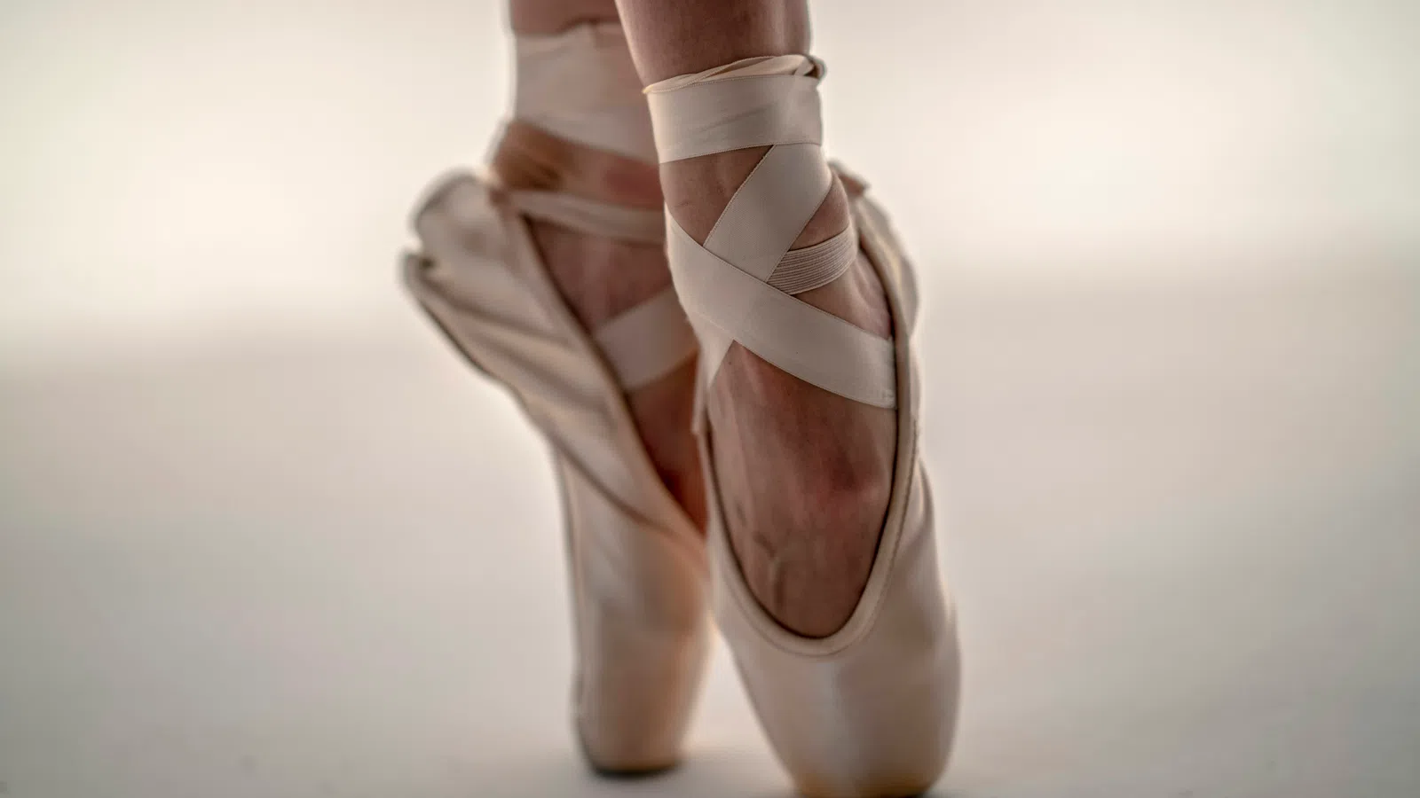 a person wearing white shoes