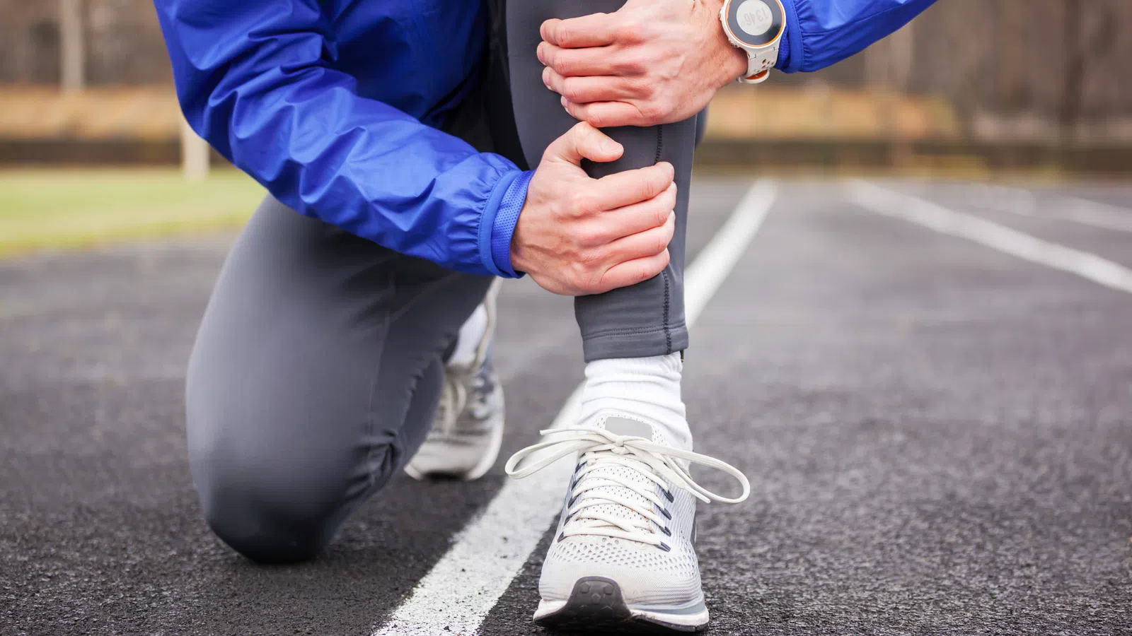 a person holding a leg