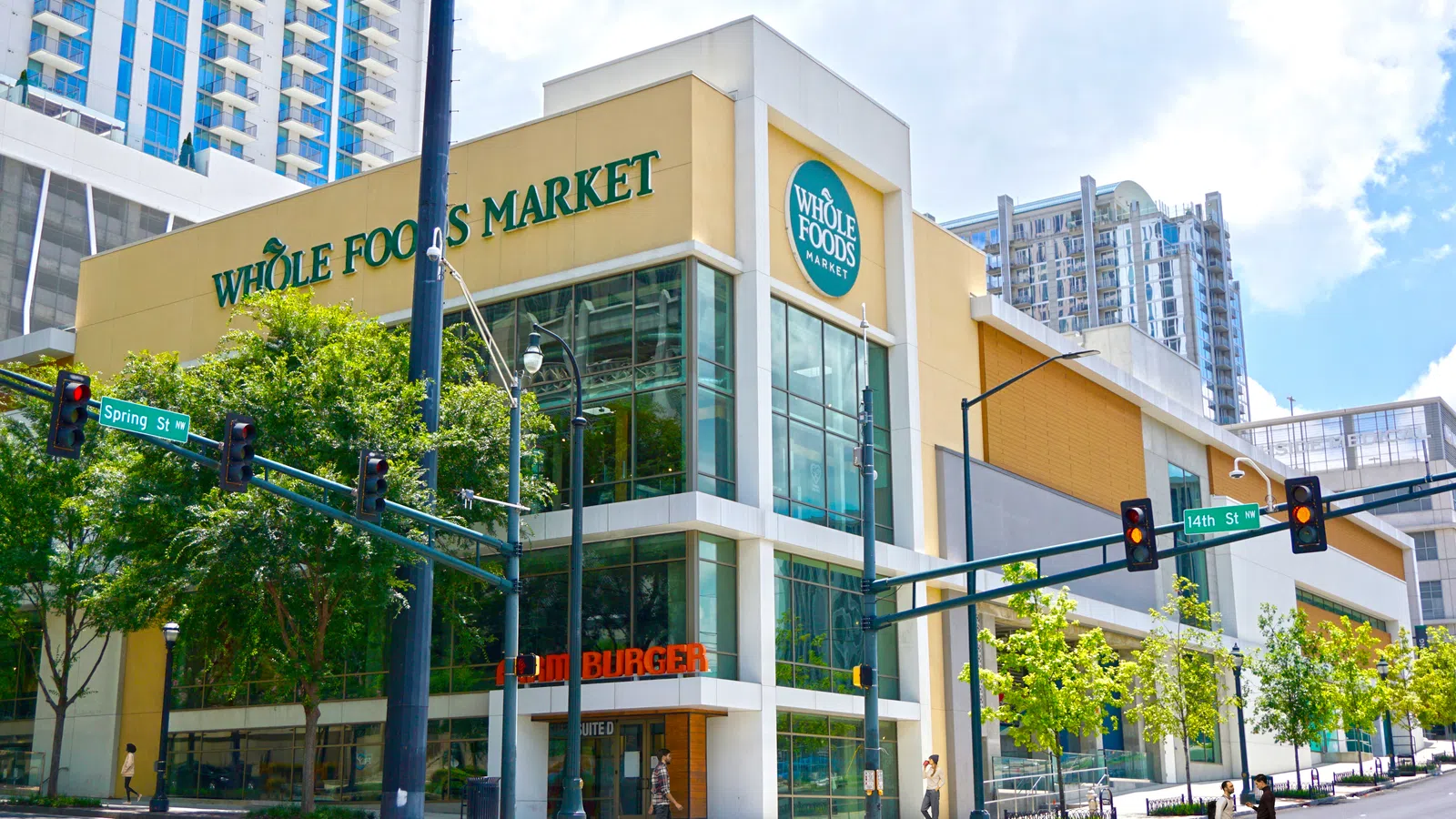As part of a urban mixed-use development, the WHOLE FOODS MARKET at 14th Street is a flagship grocery and eating destination that  engages the streetscape and forms the entry to the Midtown arts district.