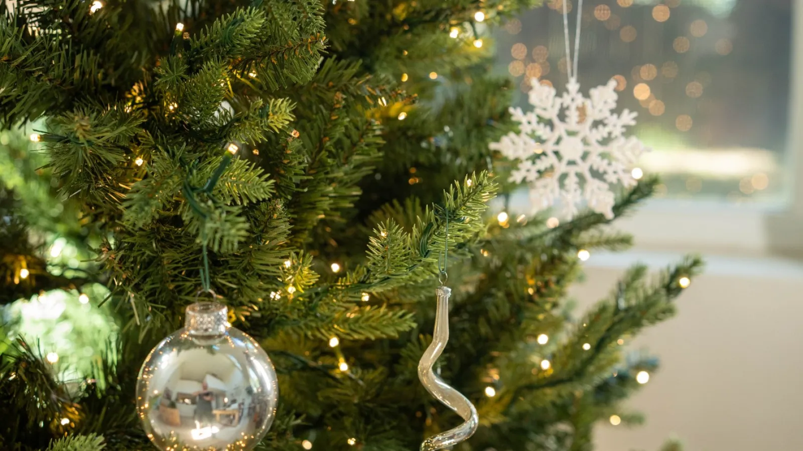 a tree with lights and ornaments