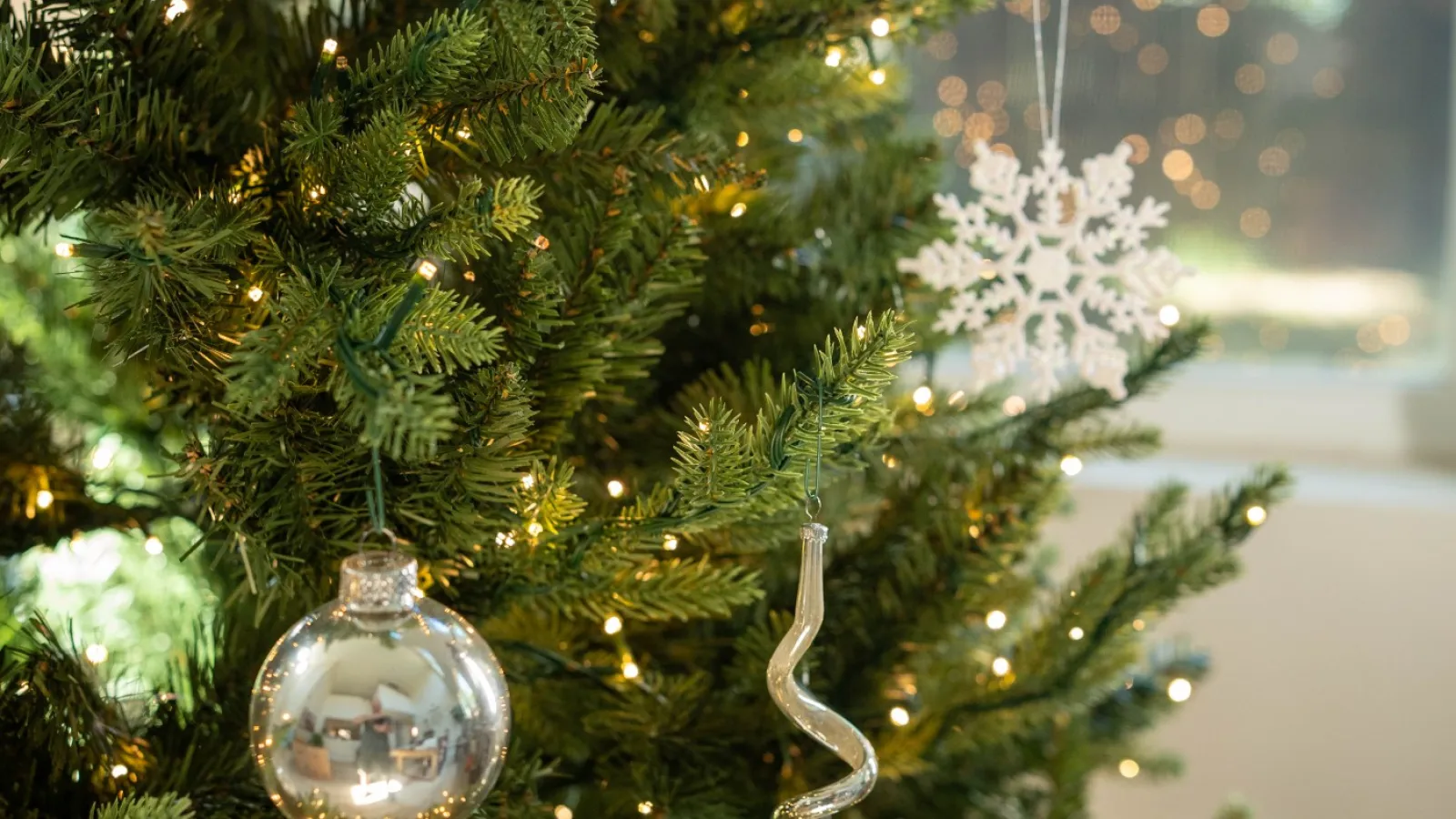 a tree with lights and ornaments