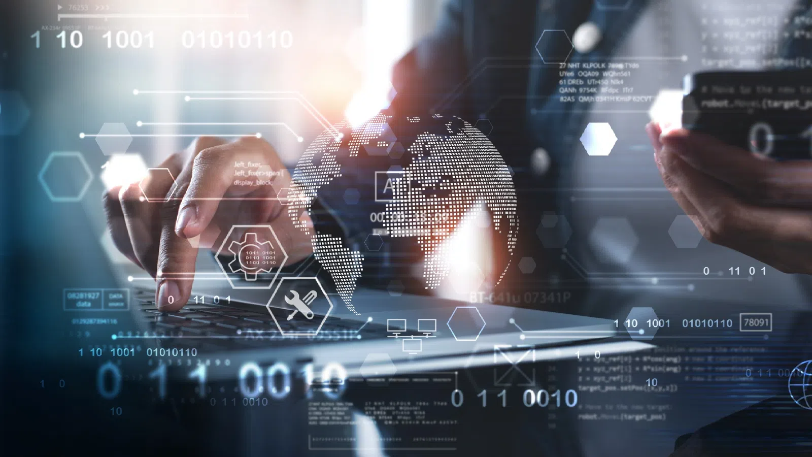 Person using laptop and smartphone with digital data and technology icons overlay in futuristic workspace