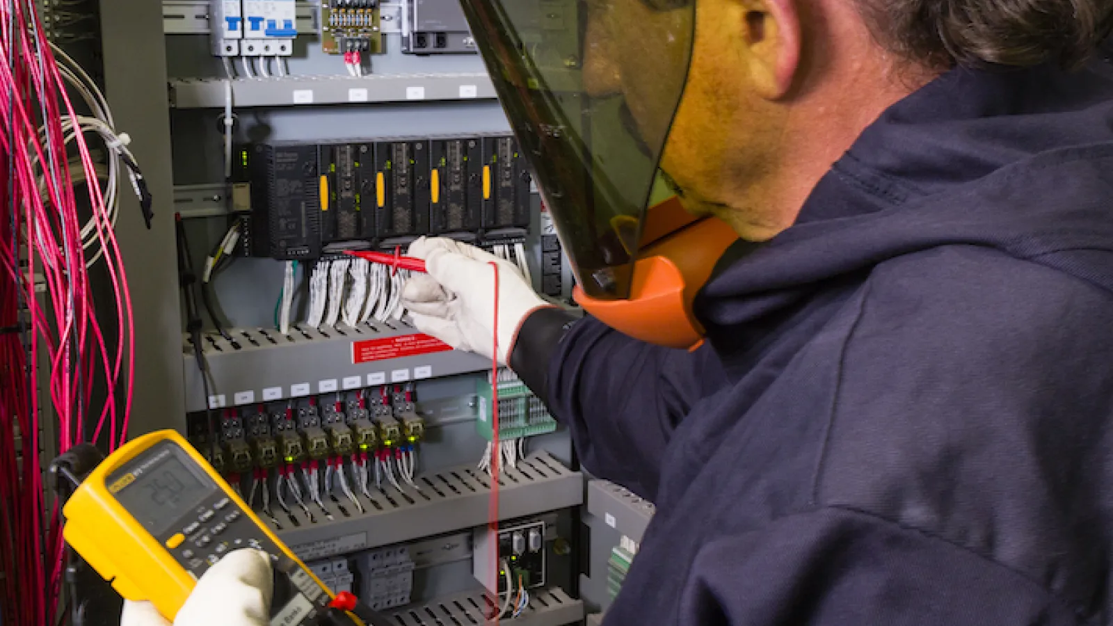 man doing breaker testing