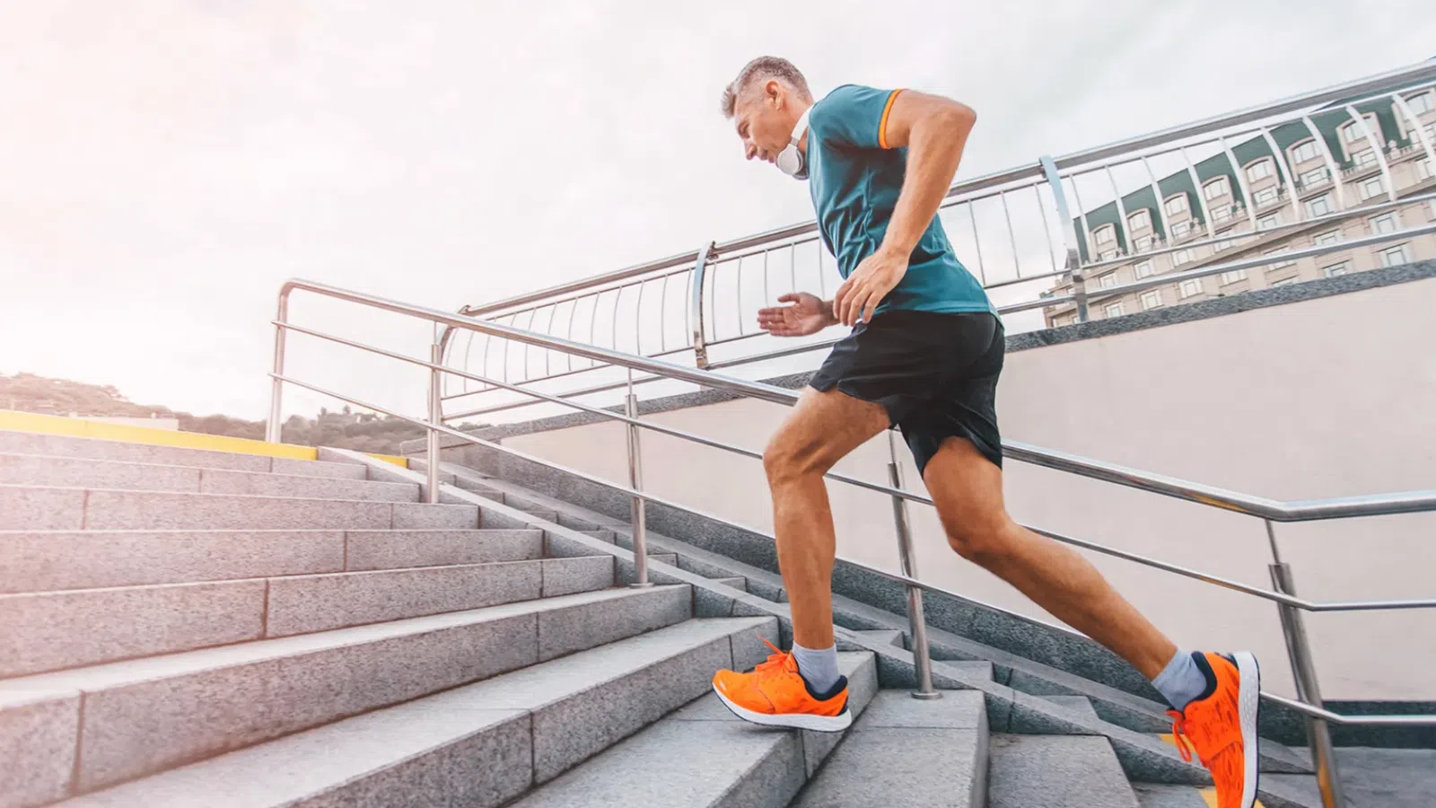a man running on a set of stairs