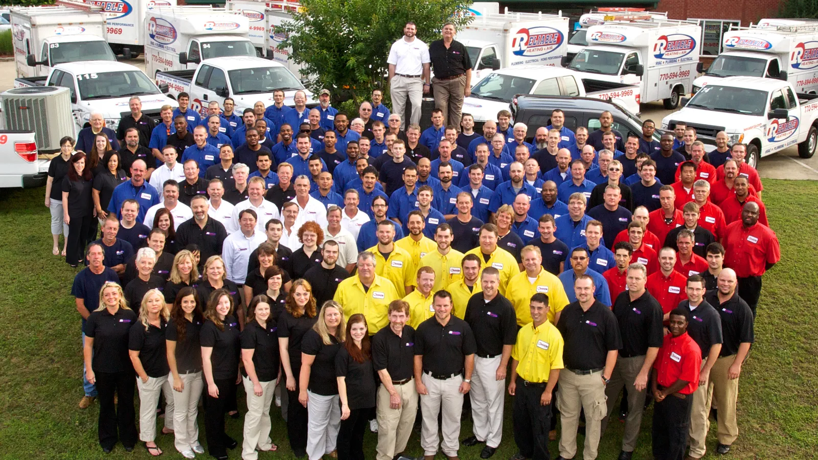 a group of people posing for the camera