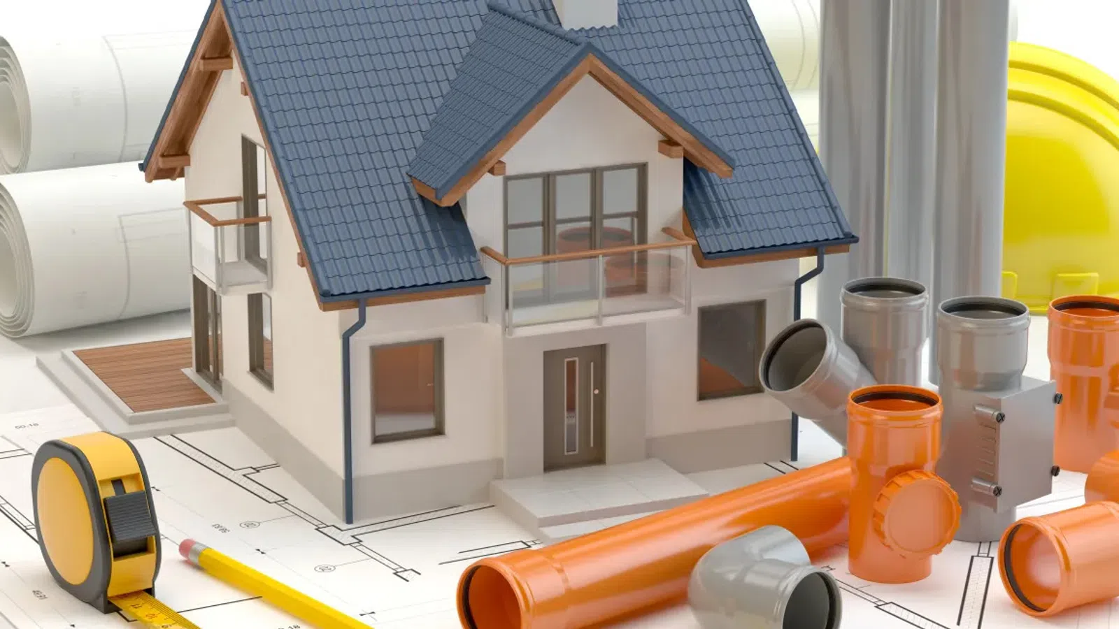 Model house with construction plans, pipes, tape measure, pencil, and yellow safety helmet on white background