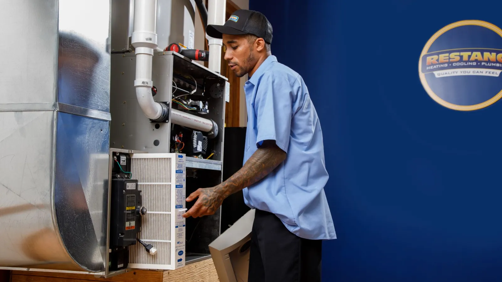 a man standing next to a machine