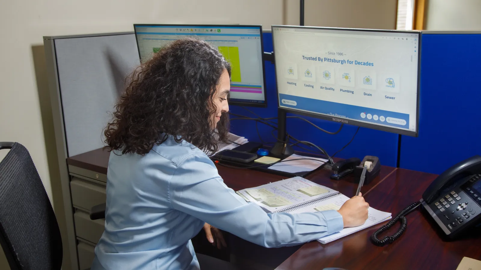 a man sitting at a desk