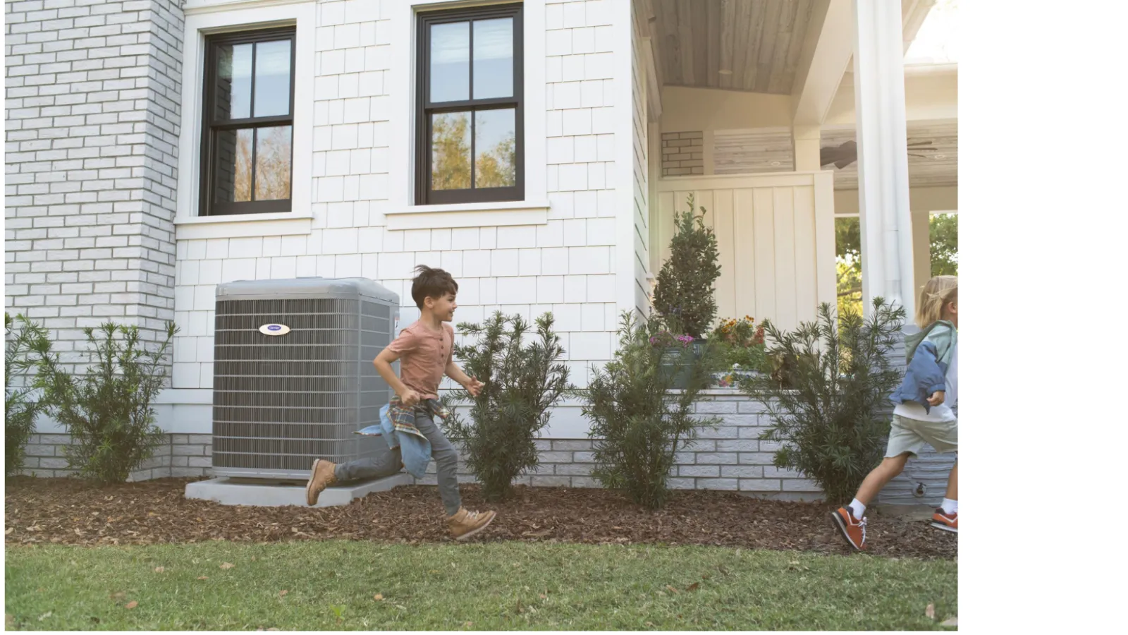 a boy throwing a frisbee