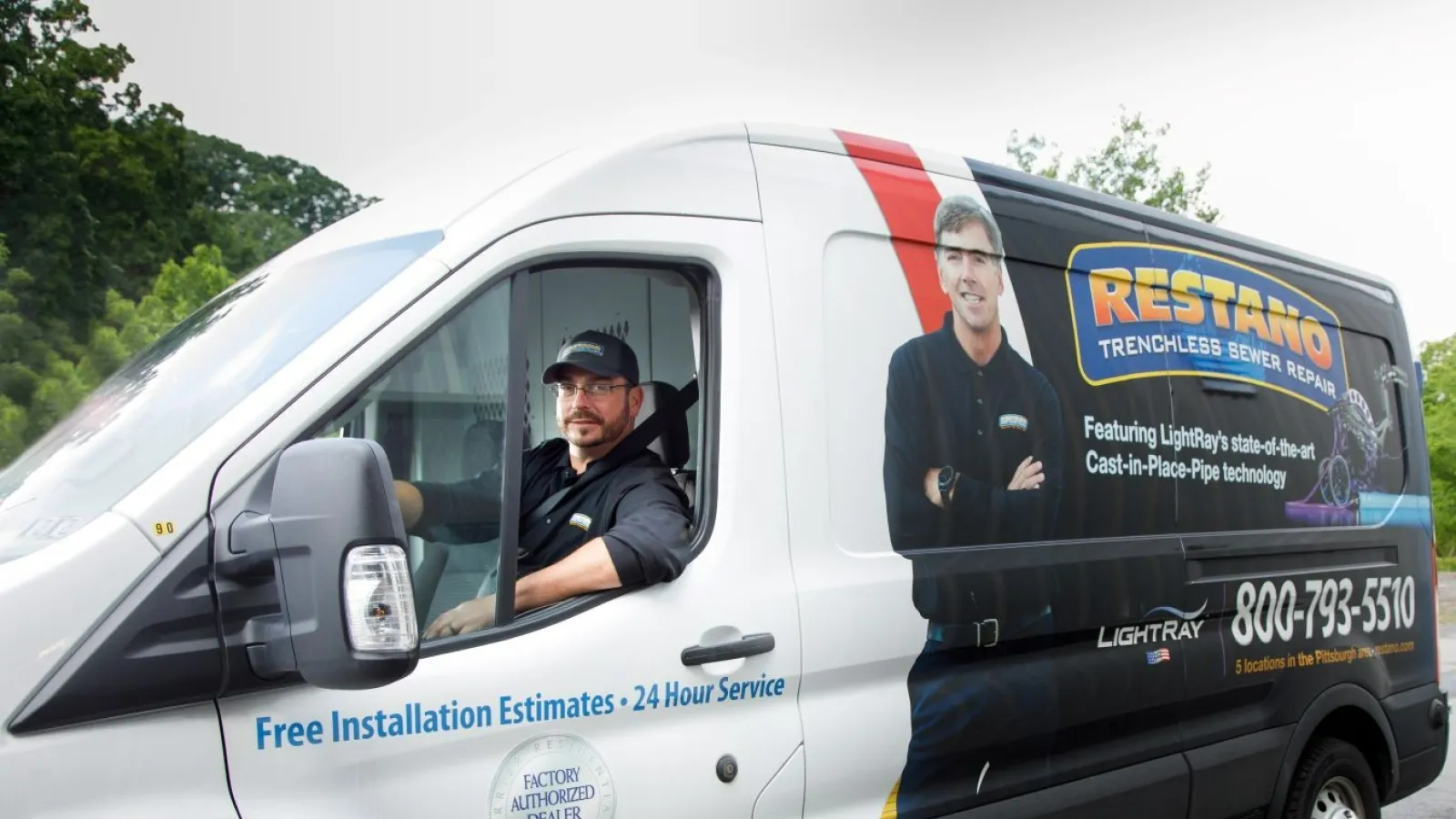 a couple of men in a white van with a black door