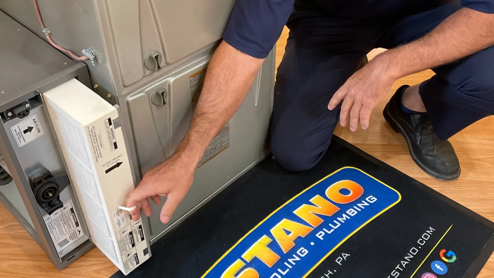 a man sitting at a table with a game board and a game