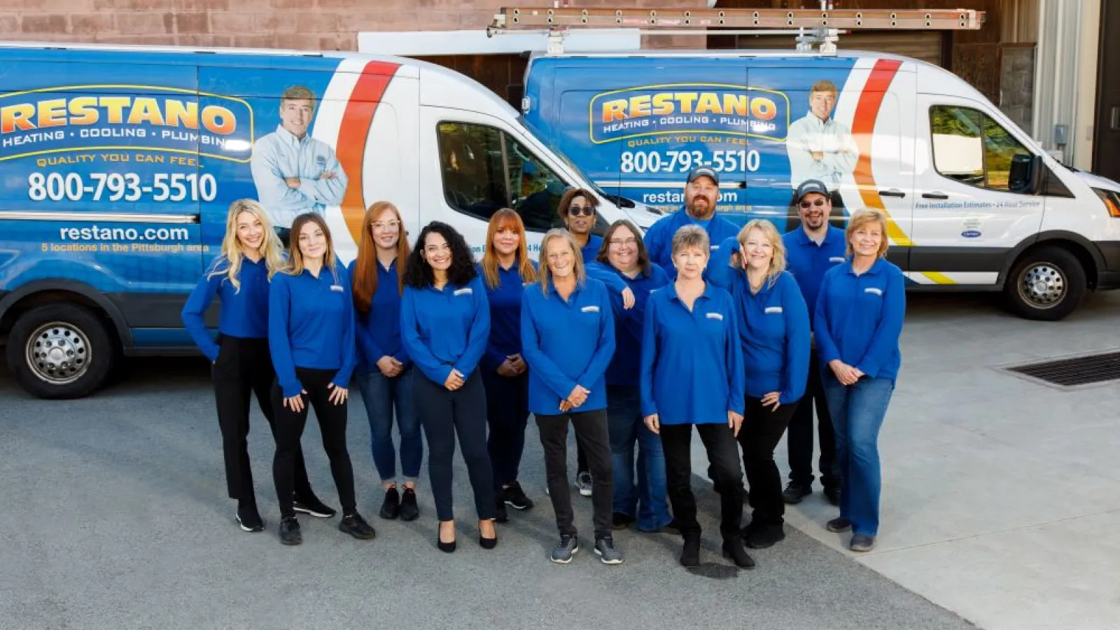 a group of people posing for a photo in front of a food truck