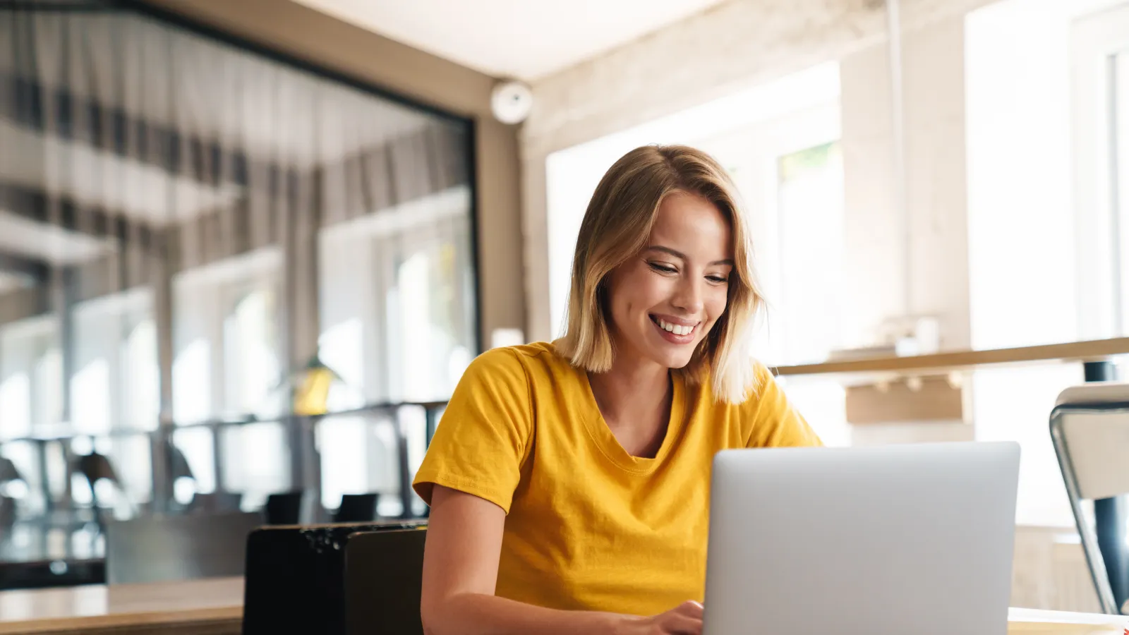 a woman working on her laptop