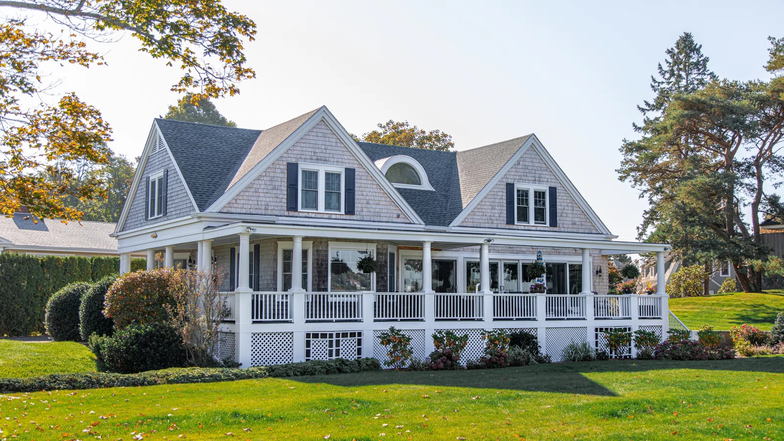 a large house with a lawn in front of it