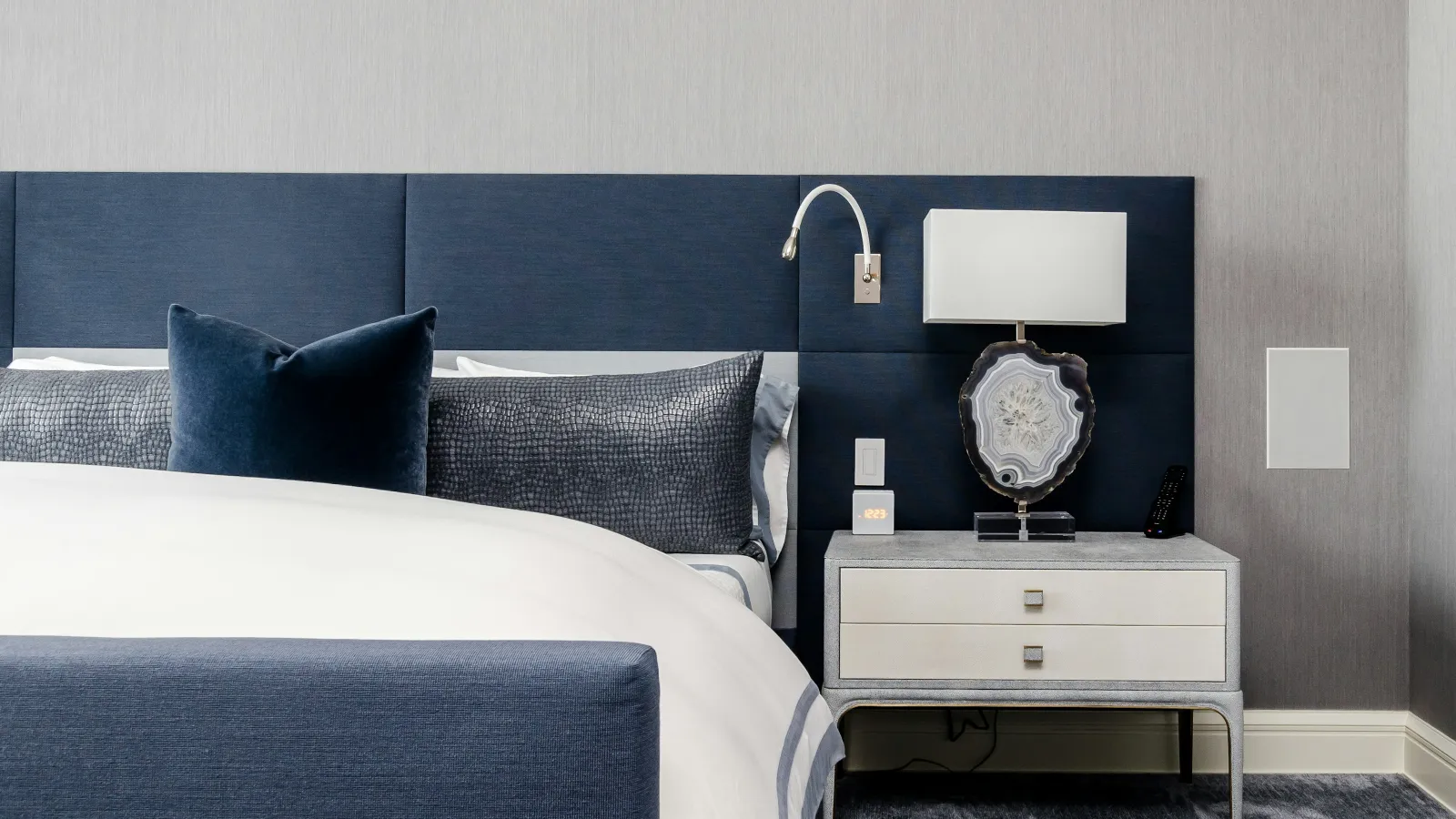 a couple of beds in a room