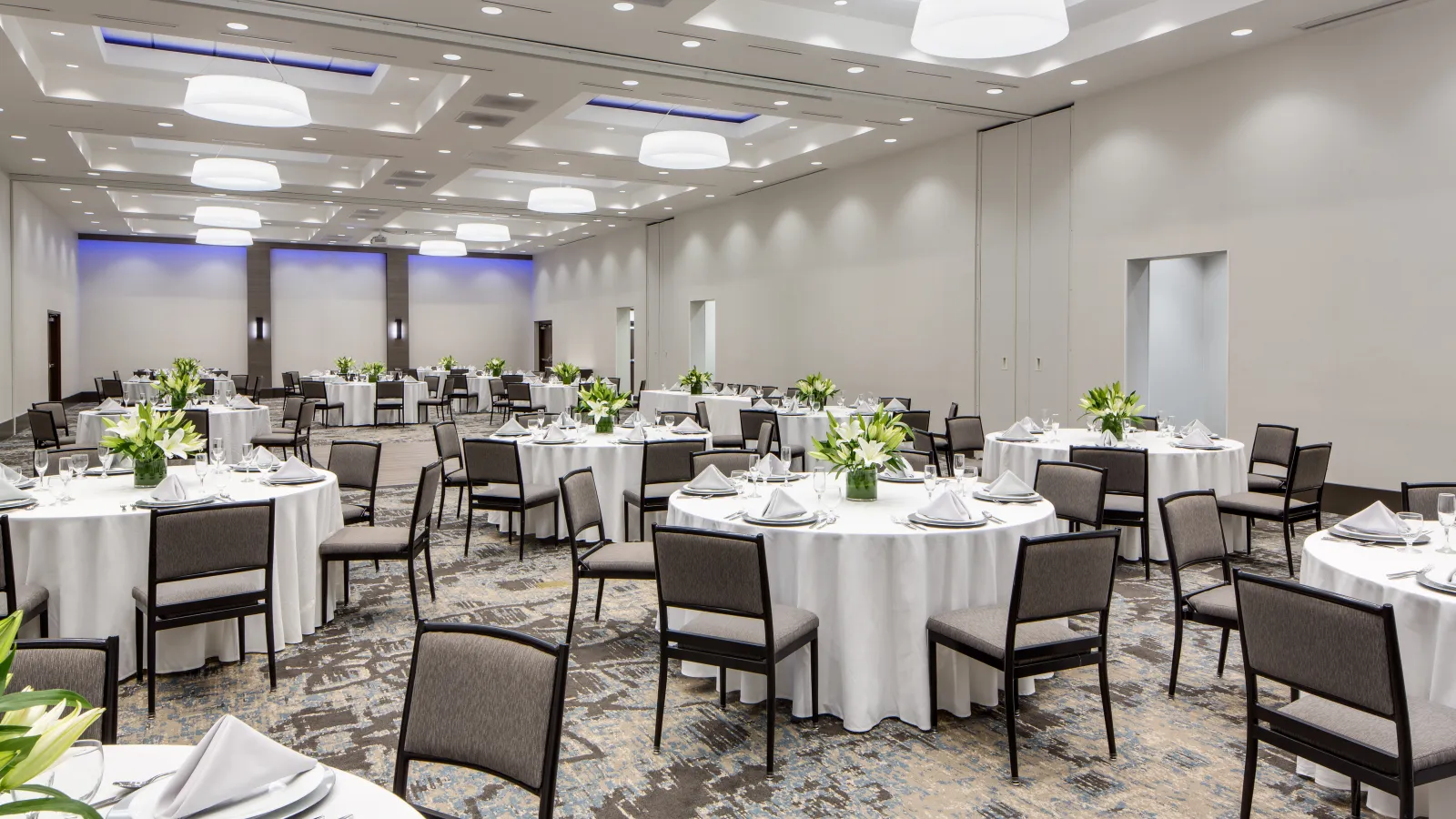 a room with tables and chairs