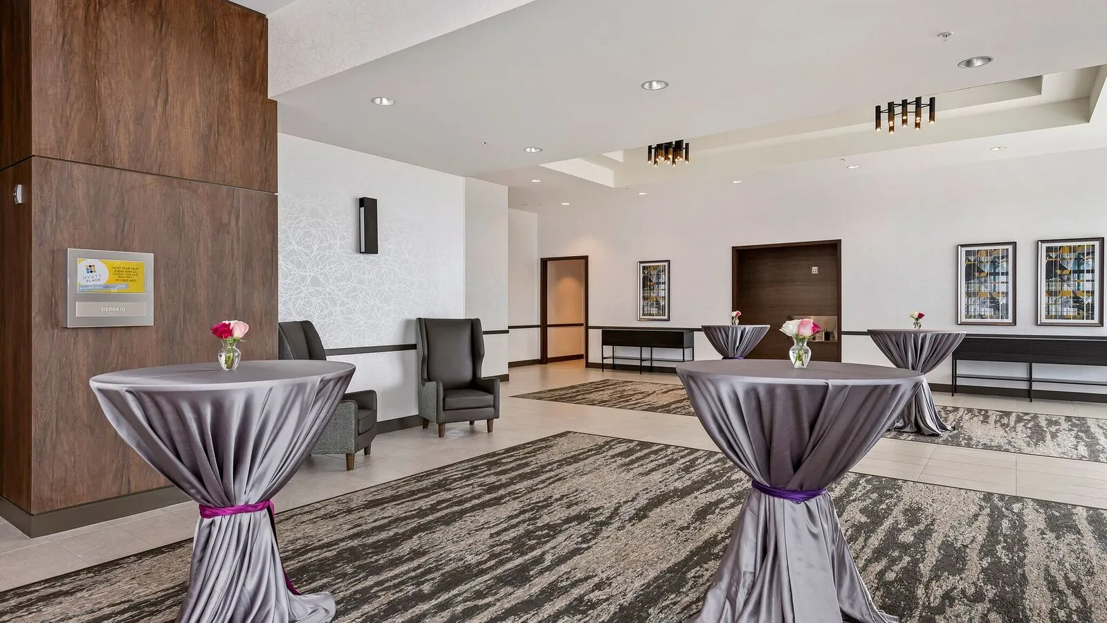 a room with chairs and tables