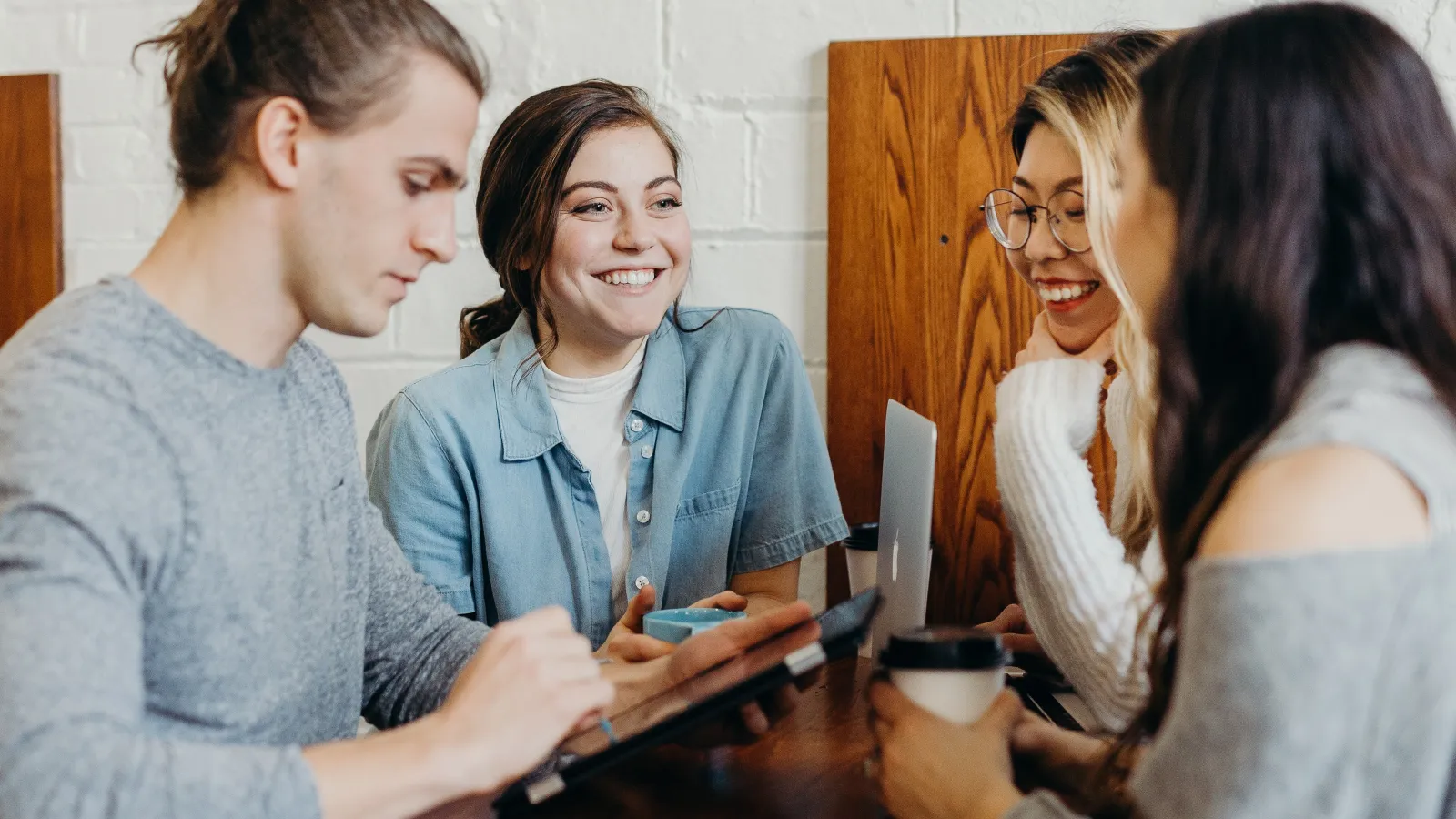 a group of people sitting at a table