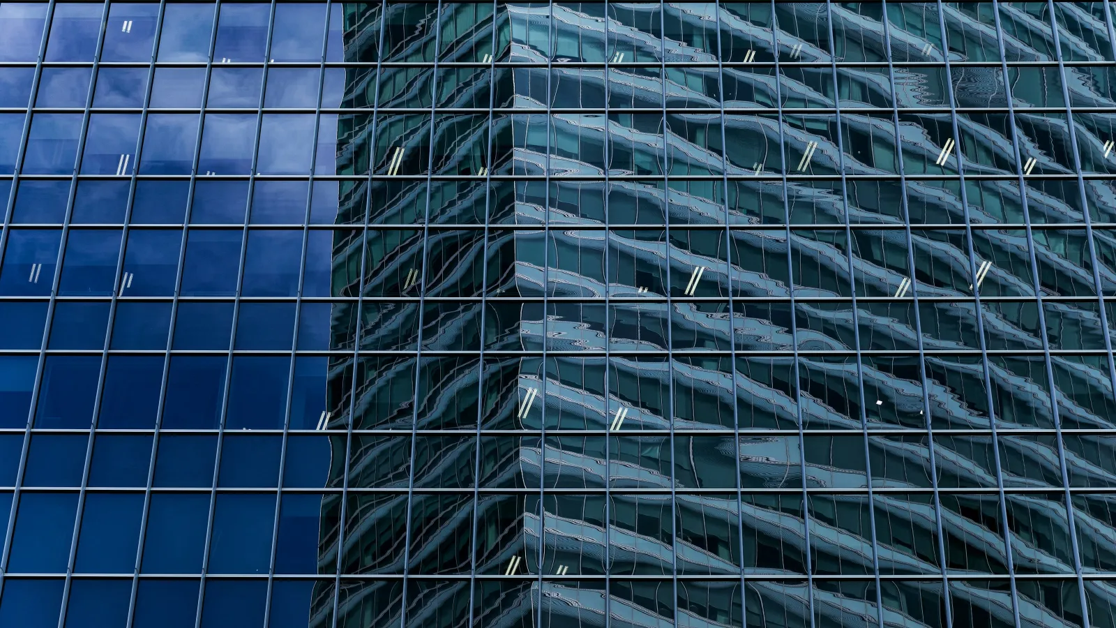 a tall building with glass windows