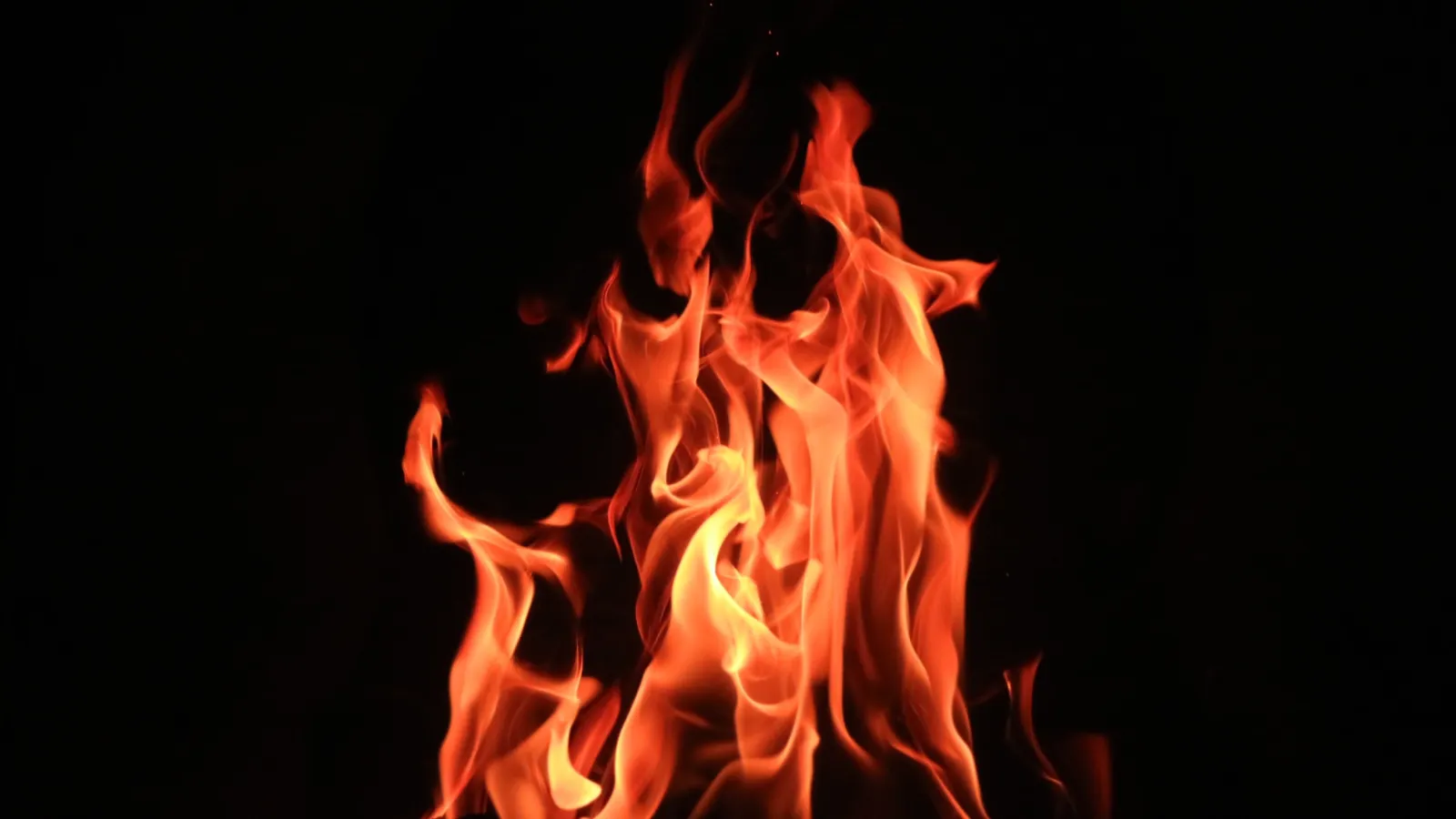 a person putting out a fire