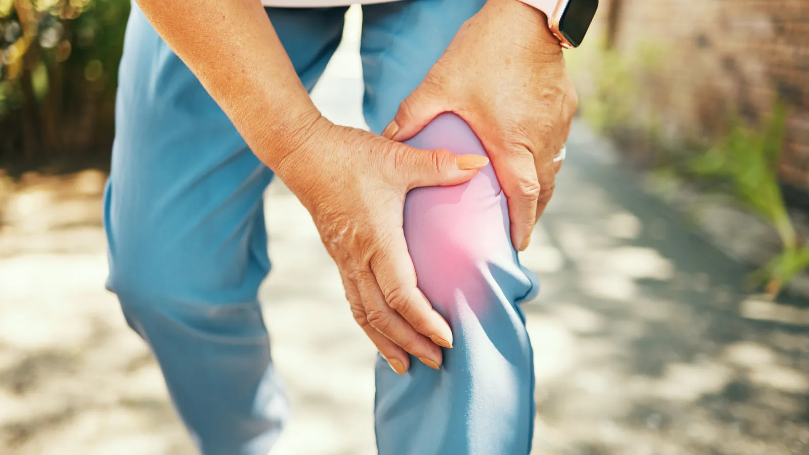 a person holding a knee