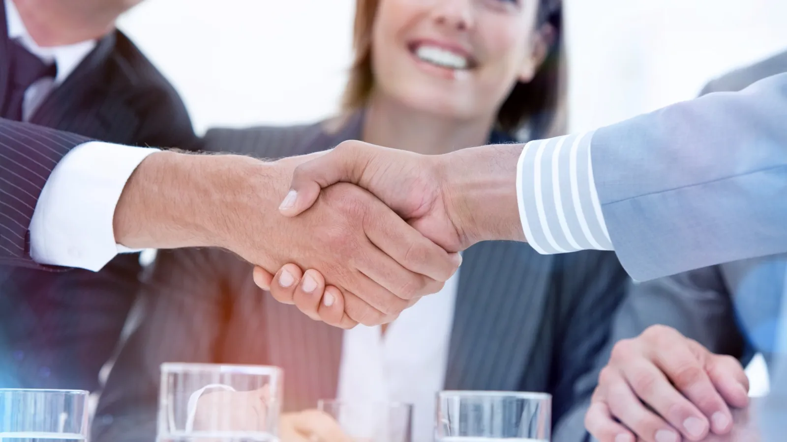 a group of people shaking hands