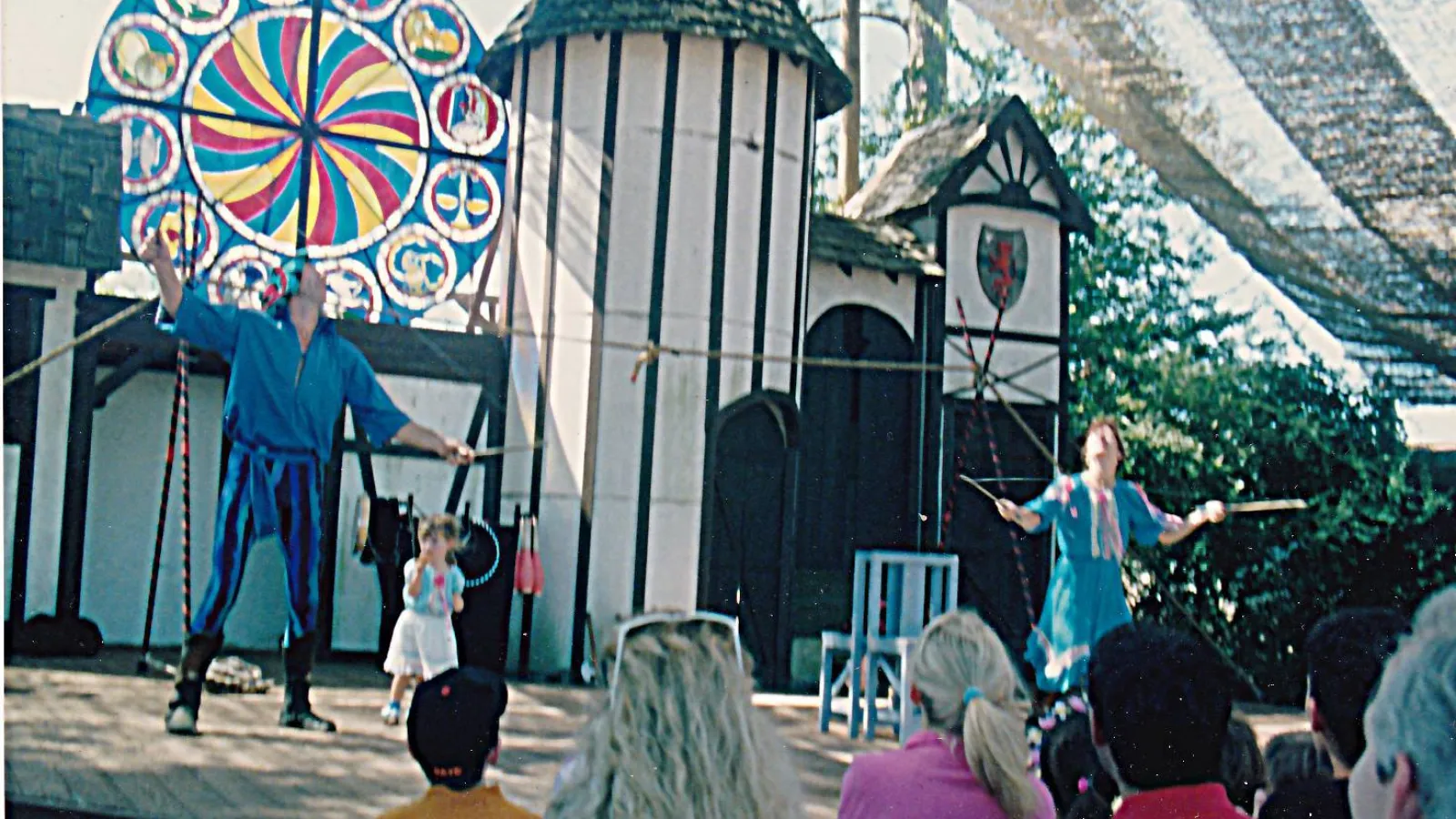 a group of people standing in front of a building