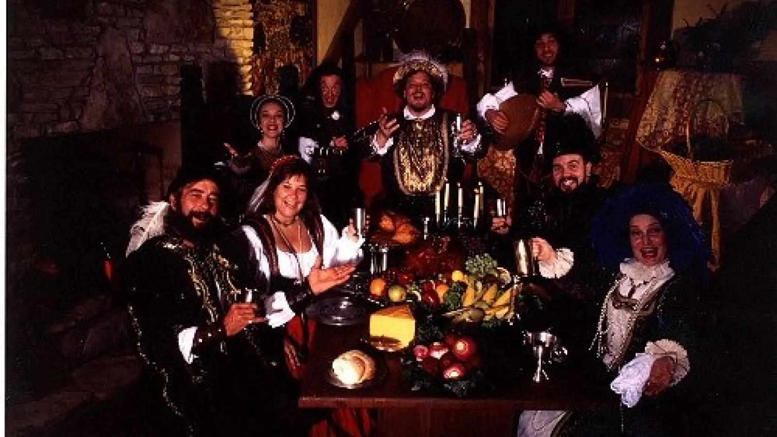 a group of people sitting posing for the camera