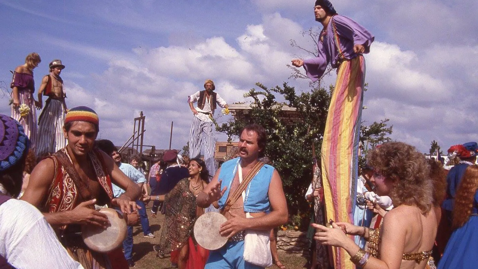 a group of people standing in front of a crowd