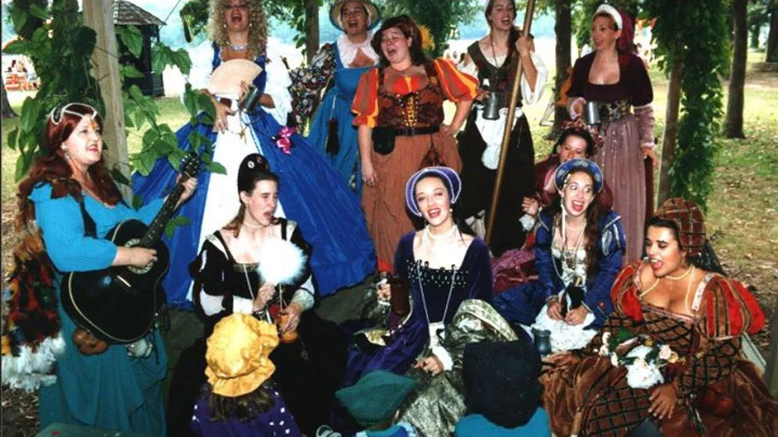 a group of people posing for the camera