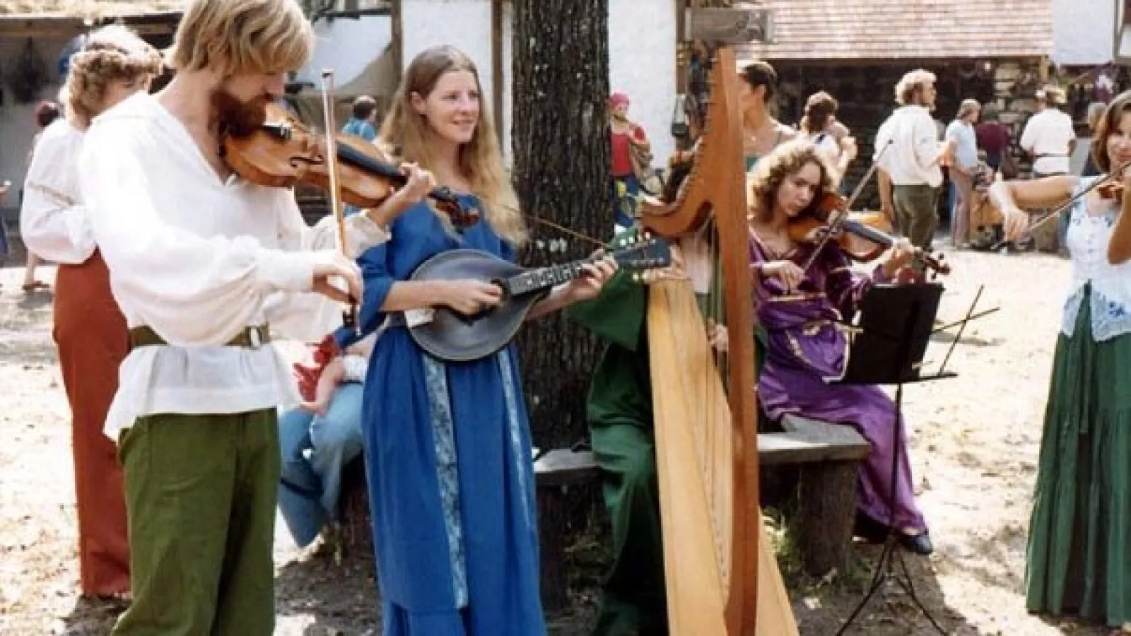 a group of people around each other