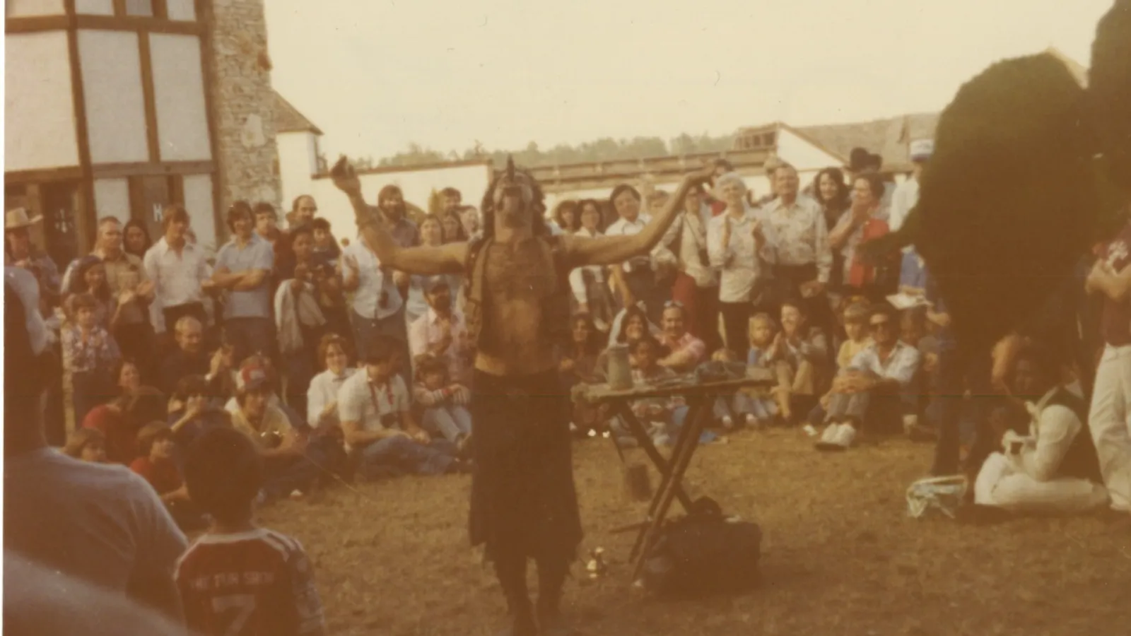 a group of people standing in front of a crowd