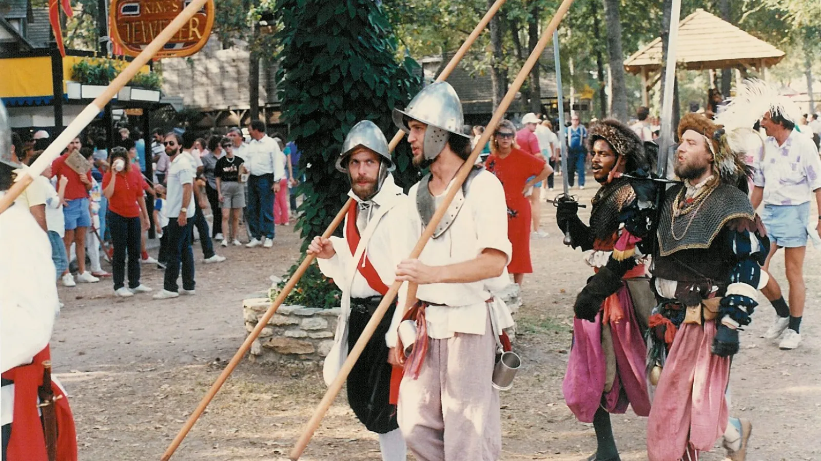 a group of people standing in front of a crowd