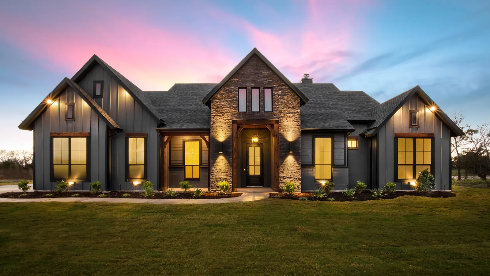 a house with a lawn in front of it