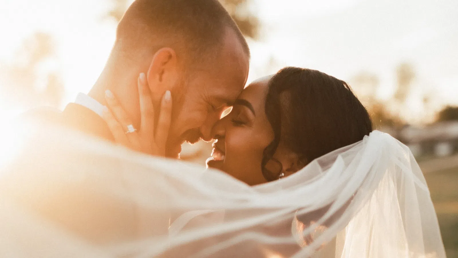 a man and woman kissing