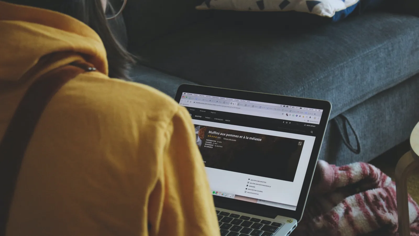 a person holding a laptop