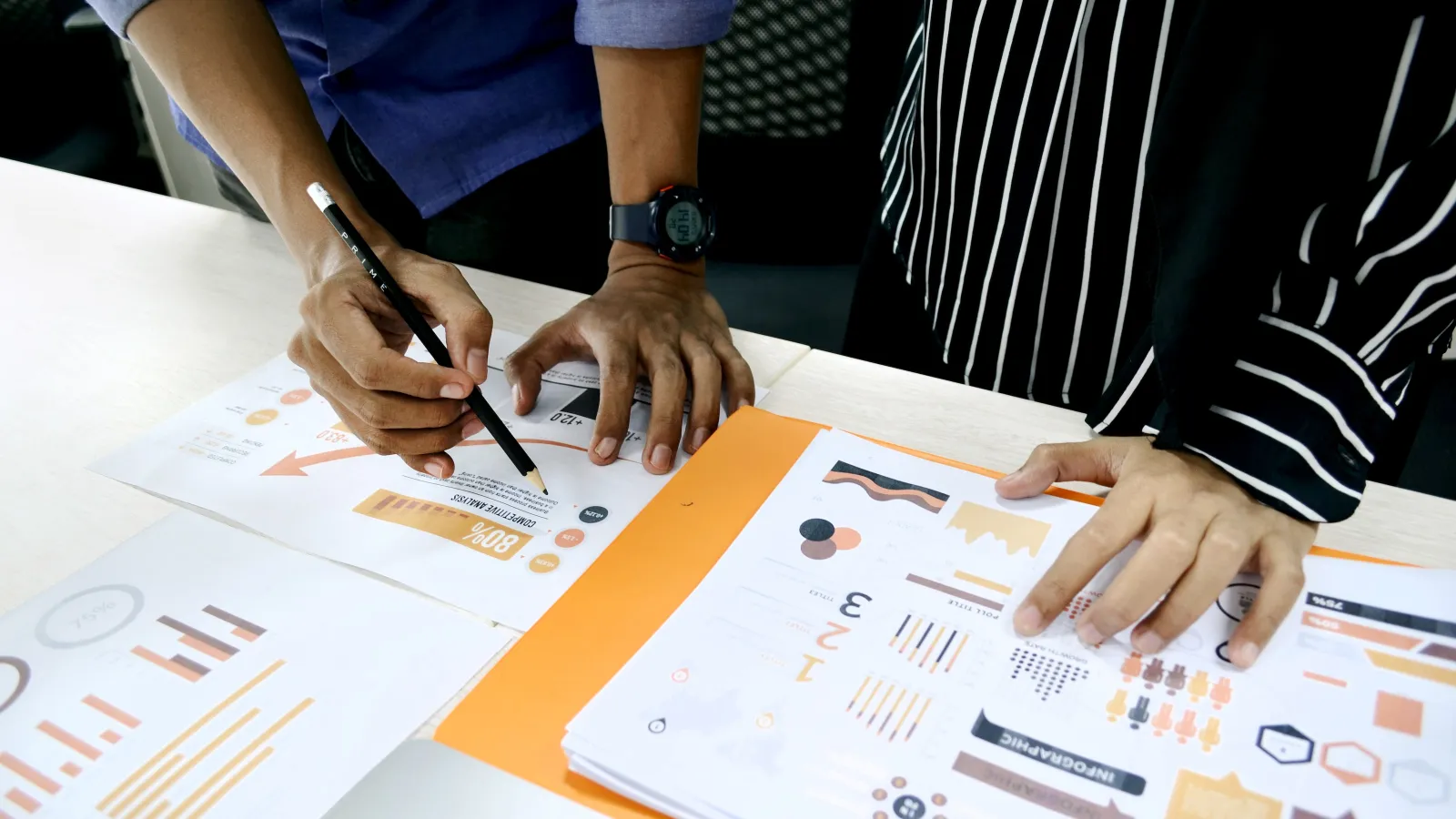 a close-up of hands doing analysis