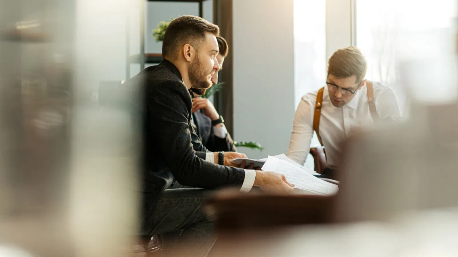 men at a meeting